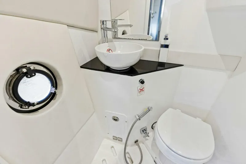 Slide: The Image of Modern bathroom in 2022 Schaefer 400 Coupe yacht with sink and toilet. - 20