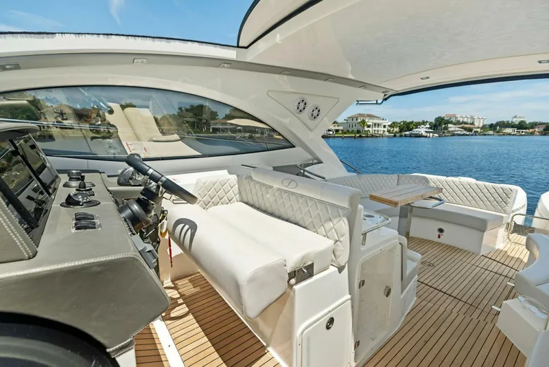 Slide: The Image of Luxurious interior of 2022 Schaefer 400 Coupe yacht with elegant seating and helm. - 22
