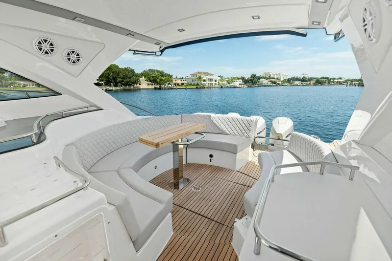 Slide: The Image of Luxurious 2022 Schaefer 400 Coupe yacht interior with waterfront view. - 26
