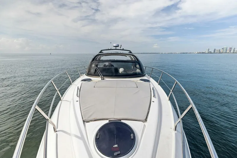Slide: The Image of 2022 Schaefer 400 Coupe yacht on calm ocean waters. - 37
