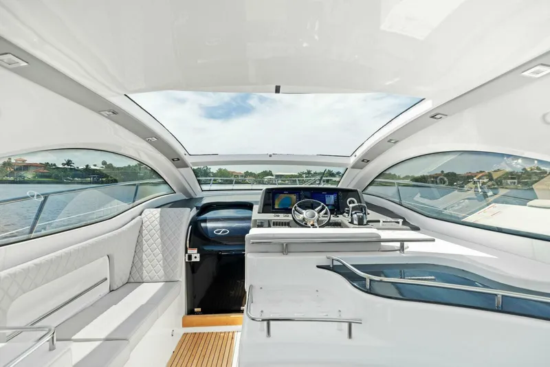 Slide: The Image of Interior of 2022 Schaefer 400 Coupe yacht with modern design and panoramic windows. - 5