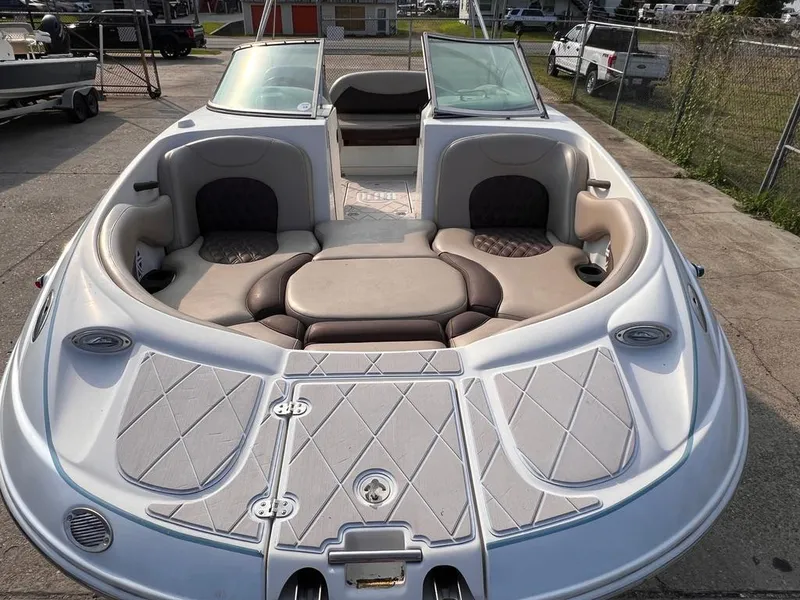 Slide: The Image of 2005 Monterey 220 Explorer Sport boat with spacious seating and sleek design. - 6
