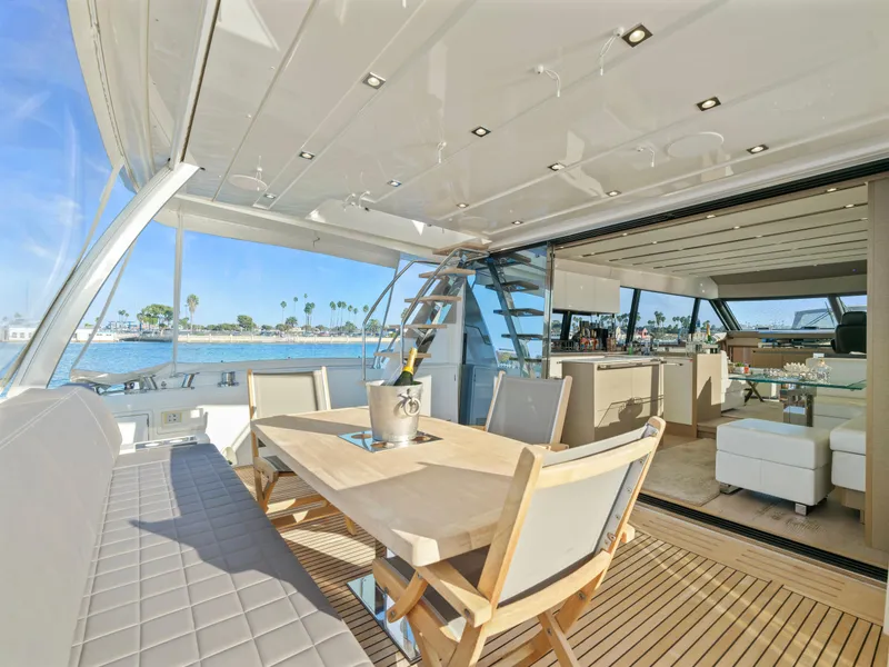 Slide: The Image of Luxurious 2018 Prestige 680 yacht interior with elegant dining area and ocean view. - 14