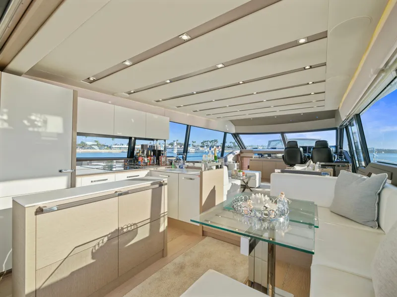 Slide: The Image of Luxurious interior of 2018 Prestige 680 yacht with modern furnishings and panoramic windows. - 15