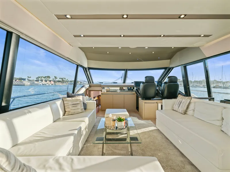 Slide: The Image of Luxurious interior of 2018 Prestige 680 yacht with panoramic windows and elegant seating. - 21