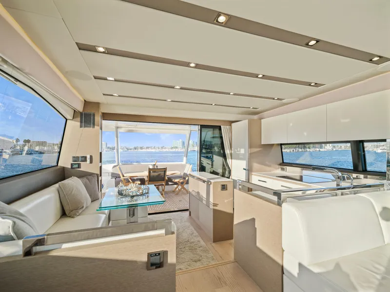 Slide: The Image of Luxurious interior of 2018 Prestige 680 yacht with modern furnishings and panoramic ocean views. - 23