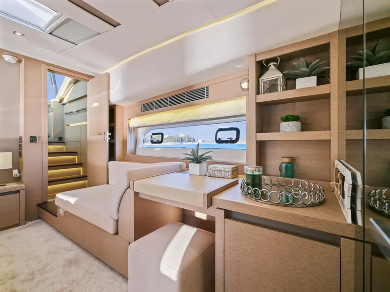 Slide: The Image of Luxurious interior of 2018 Prestige 680 yacht with modern decor and natural light. - 28