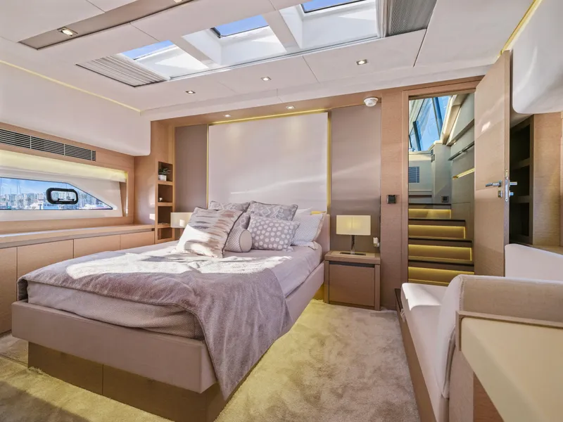 Slide: The Image of Luxurious bedroom interior of 2018 Prestige 680 yacht with skylight and modern decor. - 29