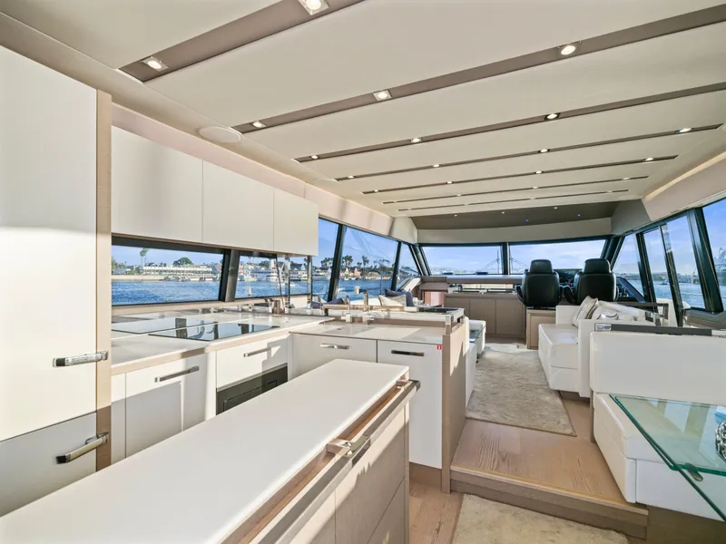 Slide: The Image of Luxurious interior of 2018 Prestige 680 yacht with modern kitchen and panoramic windows. - 31