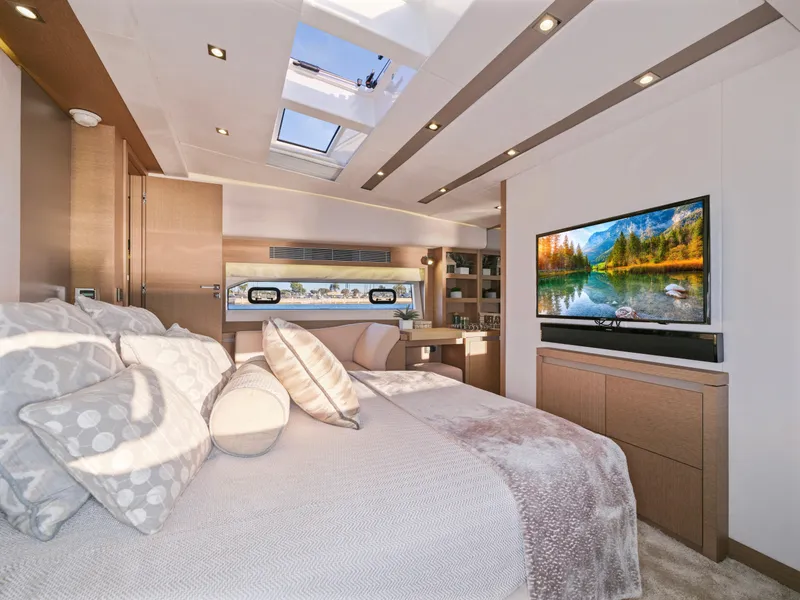 Slide: The Image of Luxurious interior of 2018 Prestige 680 yacht with cozy bed and large TV. - 37