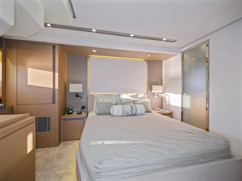 Slide: The Image of Luxurious bedroom interior of 2018 Prestige 680 yacht with modern design and ambient lighting. - 40