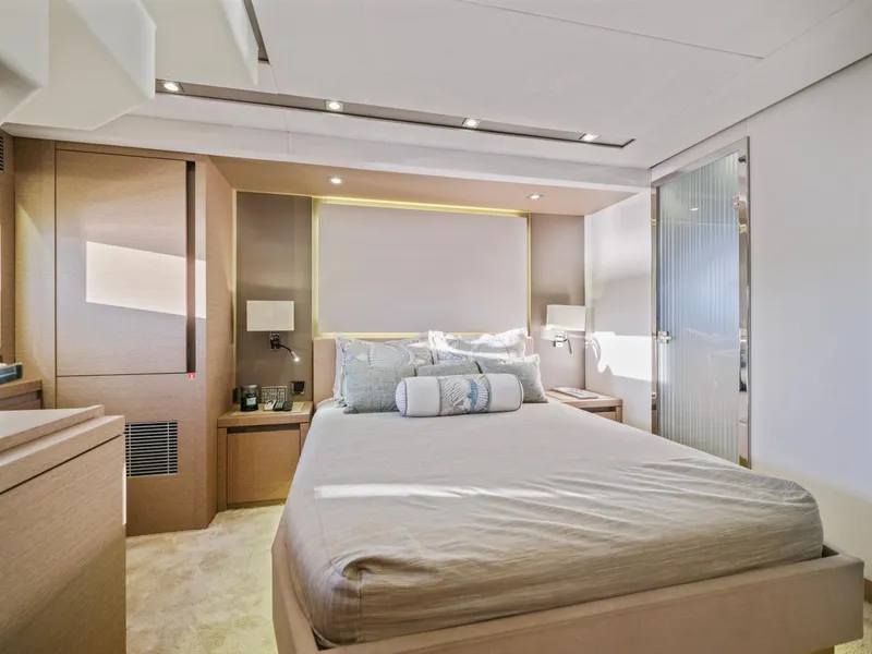 Slide: The Image of Luxurious bedroom interior of 2018 Prestige 680 yacht with modern design and ambient lighting. - 41