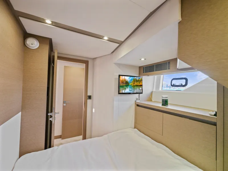 Slide: The Image of Luxurious cabin interior of 2018 Prestige 680 yacht with modern decor and natural light. - 46