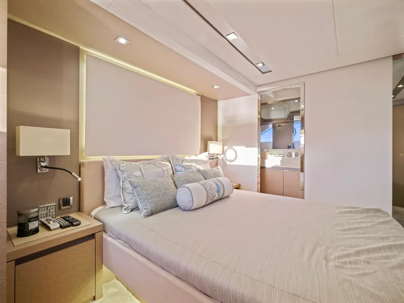 Slide: The Image of Luxurious bedroom interior of 2018 Prestige 680 yacht with modern decor and ambient lighting. - 48