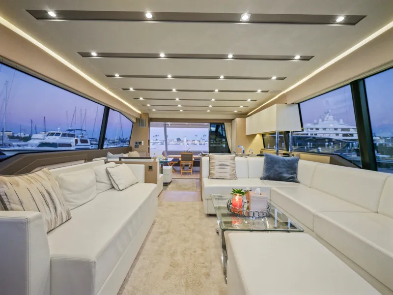 Slide: The Image of Luxurious interior of 2018 Prestige 680 yacht with elegant seating and panoramic windows. - 49