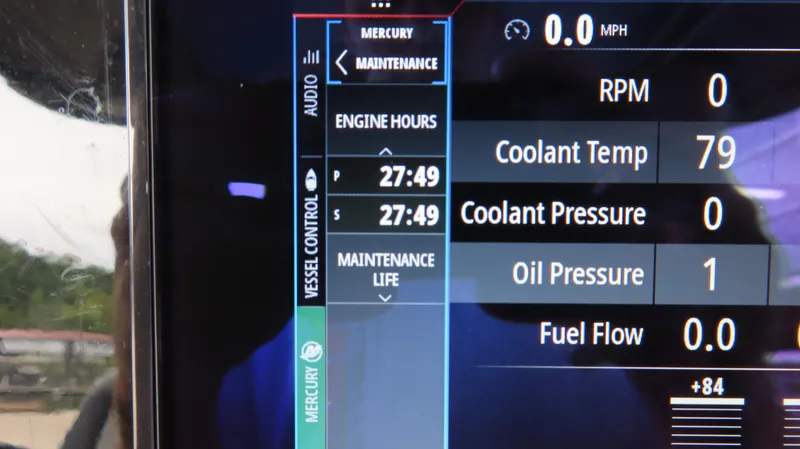 Slide: The Image of Dashboard display of 2023 Sunsation 32 CCX showing engine hours and maintenance data. - 12