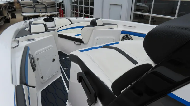 Slide: The Image of 2023 Sunsation 32 CCX boat interior with modern seating and sleek design. - 20