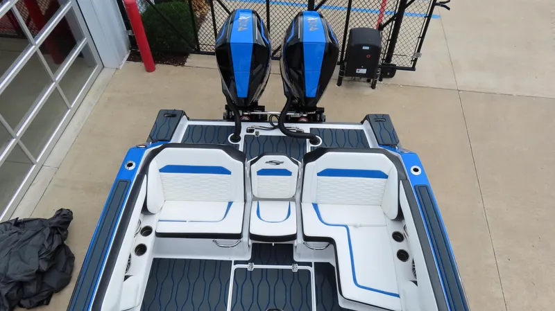 Slide: The Image of 2023 Sunsation 32 CCX boat with dual engines and stylish seating. - 22