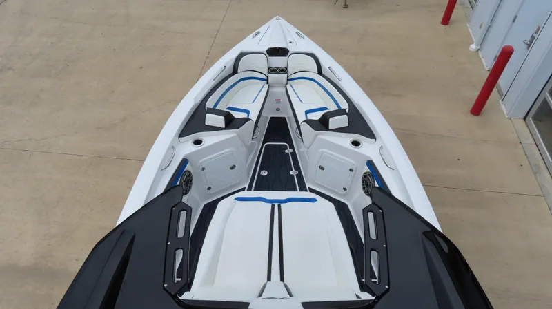 Slide: The Image of 2023 Sunsation 32 CCX boat, aerial view of sleek deck design. - 23