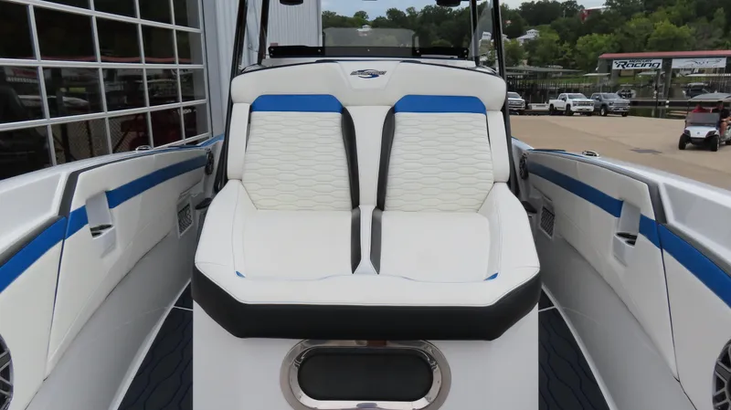 Slide: The Image of 2023 Sunsation 32 CCX boat interior with white and blue seating. - 25