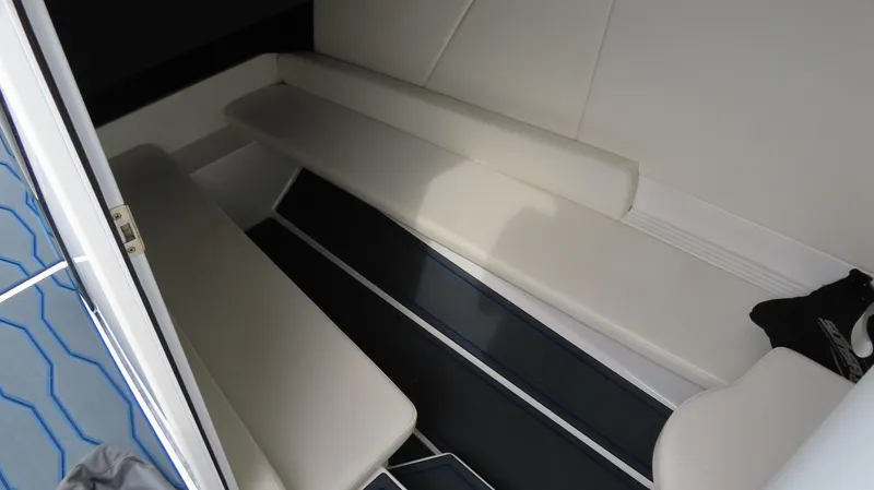 Slide: The Image of 2023 Sunsation 32 CCX cabin interior with sleek seating and modern design. - 6