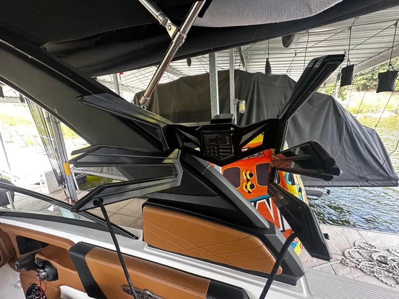 Slide: The Image of Interior view of a 2021 Chaparral 26 Surf boat with modern design. - 12