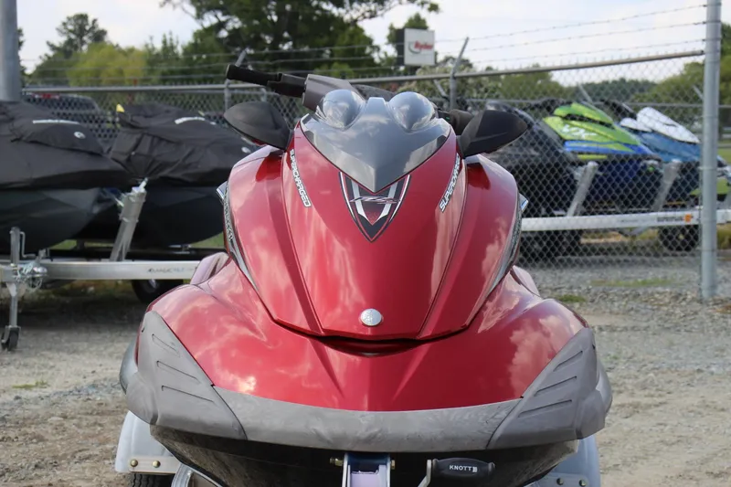 Slide: The Image of Red 2011 Yamaha WaveRunner FZS jet ski parked outdoors. - 15