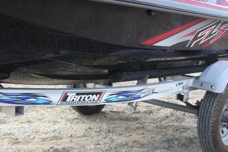 Slide: The Image of 2011 Yamaha WaveRunner FZS on Triton trailer, parked on gravel. - 17