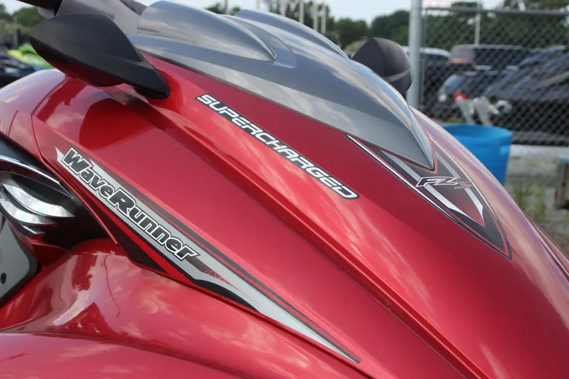 Slide: The Image of Red 2011 Yamaha WaveRunner FZS, supercharged model, close-up view. - 8