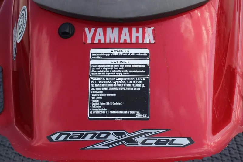 Slide: The Image of 2011 Yamaha WaveRunner FZS, red with warning labels and nanoXcel branding. - 9