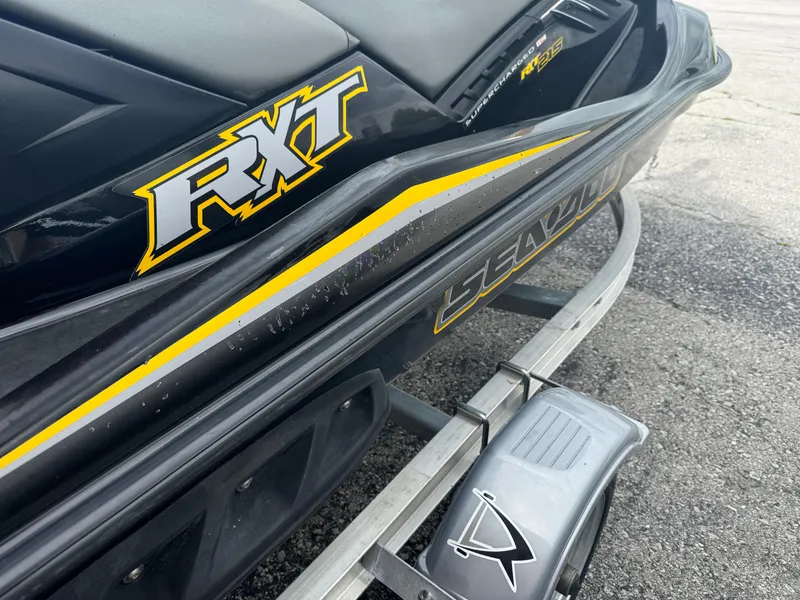 Slide: The Image of 2007 Sea-Doo RXT jet ski on trailer, close-up view. - 4