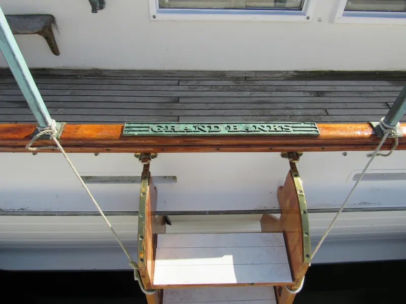 Slide: The Image of Grand Banks 42 Classic 1973 yacht with wooden deck and ladder. - 4