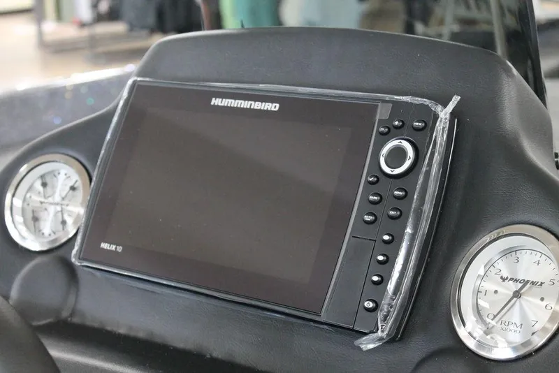 Slide: The Image of 2025 Phoenix 818 Pro dashboard featuring a Humminbird Helix 10 fishfinder and gauges. - 4
