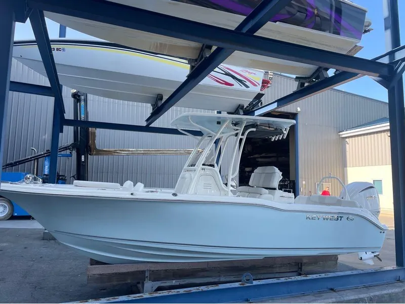 Slide: The Image of 2025 Key West 239 FS boat in storage facility. - 11