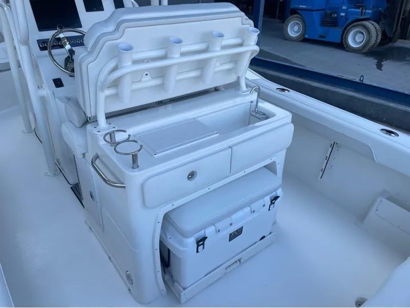 Slide: The Image of 2025 Key West 239 FS boat interior with seating and storage. - 14