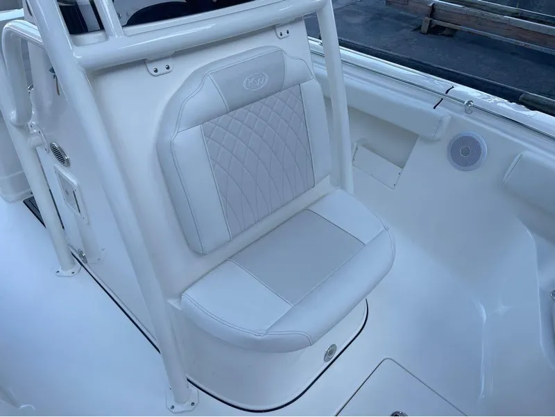 Slide: The Image of 2025 Key West 239 FS boat seat with white upholstery and diamond stitching. - 16
