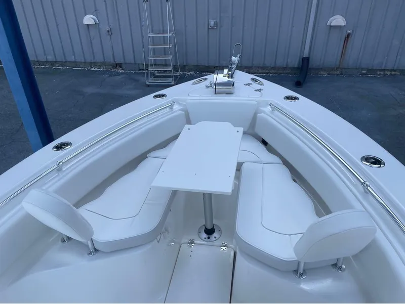 Slide: The Image of 2025 Key West 239 FS boat interior with seating and table. - 4