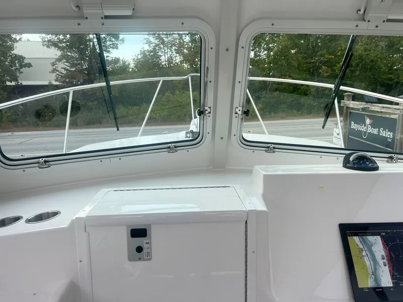 Slide: The Image of 2024 Steiger Craft 31 Fisherman boat interior with dashboard view. - 13