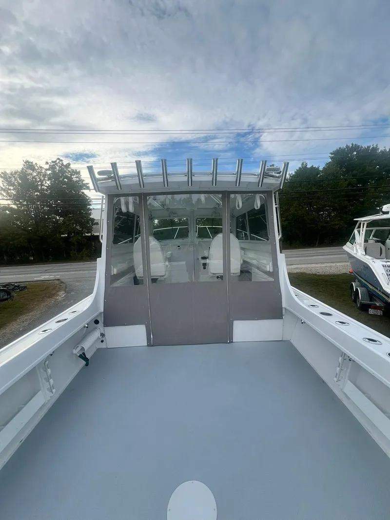 Slide: The Image of 2024 Steiger Craft 31 Fisherman boat with spacious deck and modern design. - 15