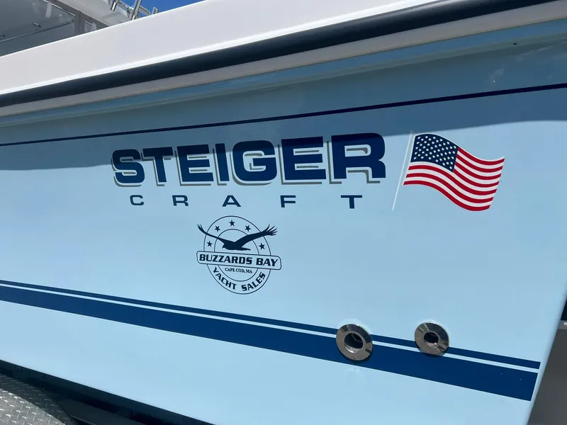 Slide: The Image of 2024 Steiger Craft 31 Fisherman boat with American flag decal. - 4