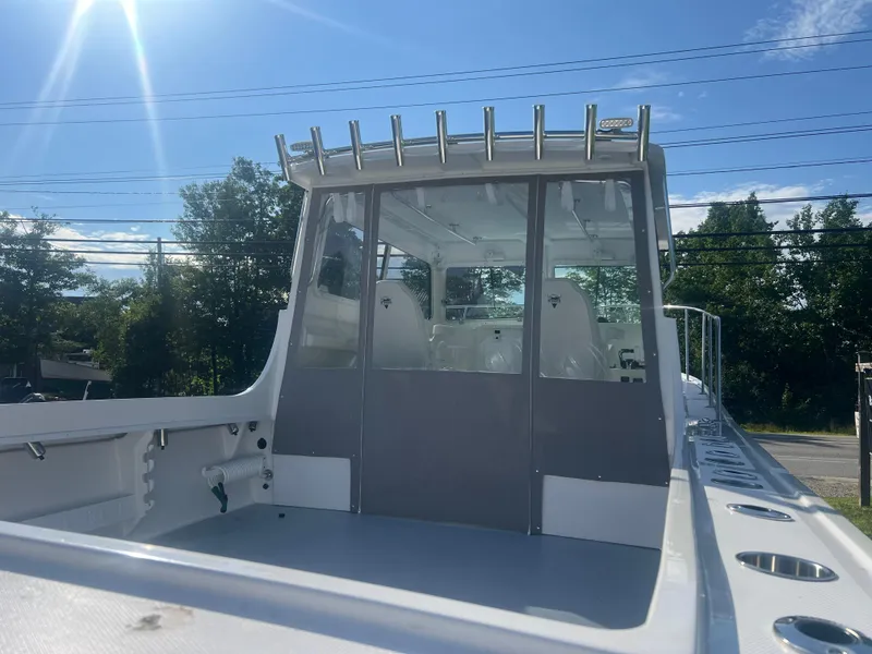 Slide: The Image of 2024 Steiger Craft 31 Fisherman boat under sunny sky. - 6