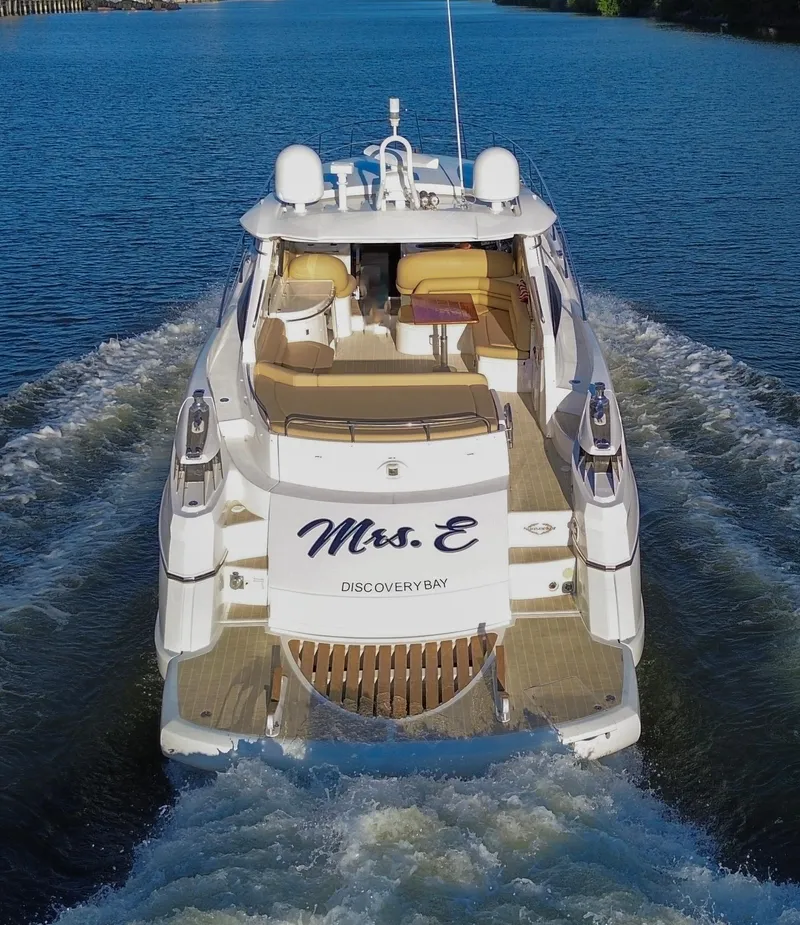 Slide: The Image of Sunseeker Predator 61 yacht cruising on a river, rear view, 2002 model. - 7