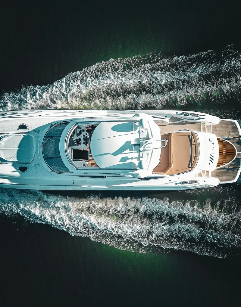 Slide: The Image of Aerial view of 2002 Sunseeker Predator 61 yacht cruising on water. - 8