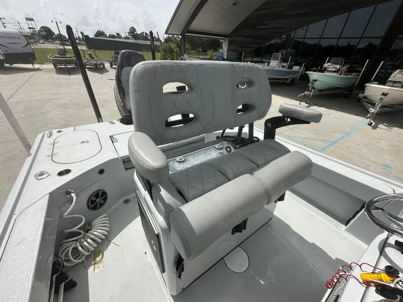 Slide: The Image of 2021 Blazer 2700 HYBRID BAY boat with cushioned seating and modern design. - 10