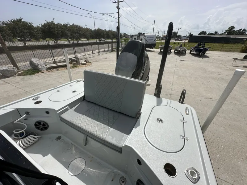 Slide: The Image of 2021 Blazer 2700 HYBRID BAY boat interior with seating and storage compartments. - 13