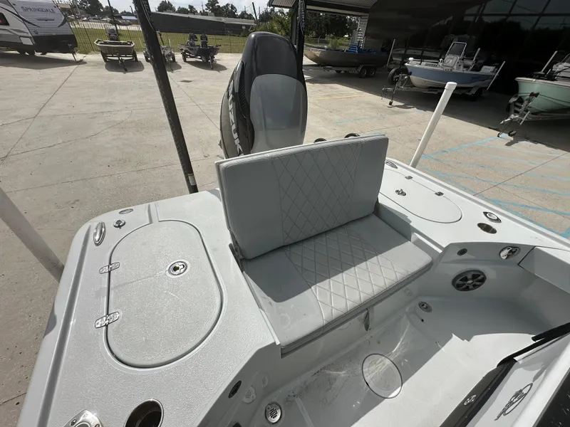 Slide: The Image of 2021 Blazer 2700 HYBRID BAY boat interior with seating and storage compartments. - 15