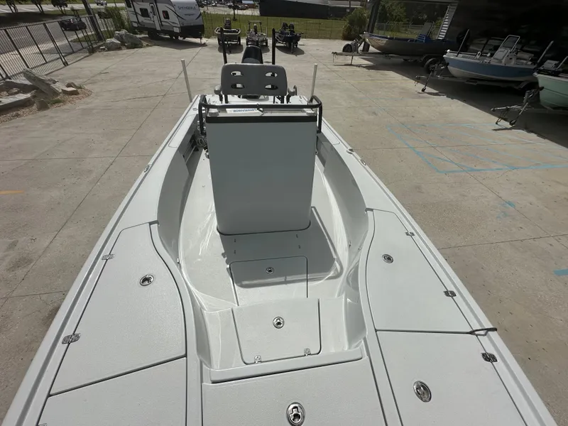 Slide: The Image of 2021 Blazer 2700 HYBRID BAY boat, spacious deck, parked outdoors. - 17