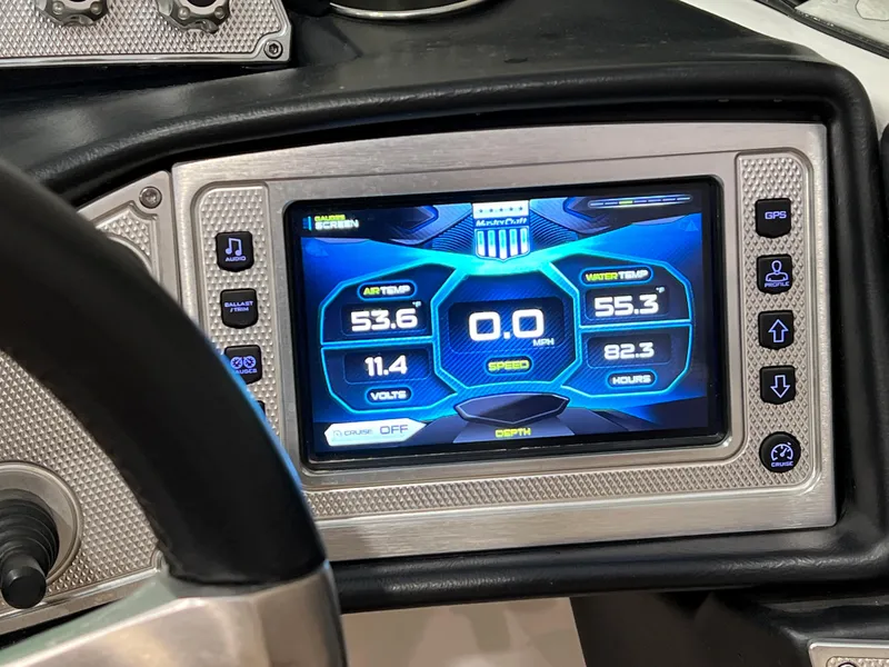 Slide: The Image of 2016 MasterCraft X26 dashboard display showing speed, air and water temperature. - 41