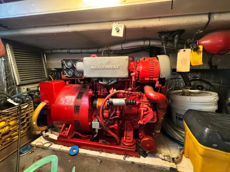 Slide: The Image of Engine room of 1993 Ocean Yachts 42 Super Sport with Westerbeke generator. - 23