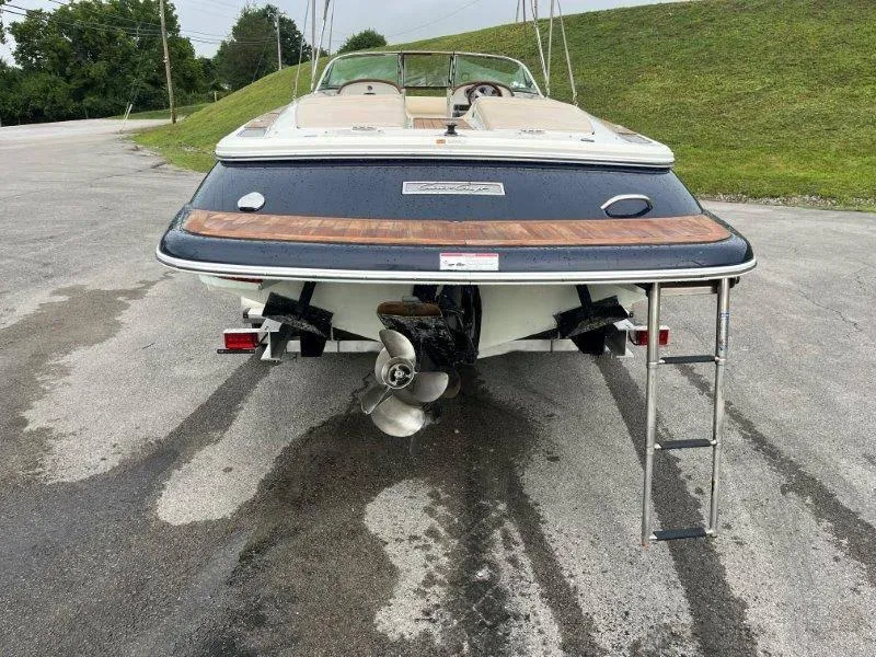Slide: The Image of 2009 Chris-Craft Launch 25 Heritage Edition boat, rear view with ladder and propeller. - 11